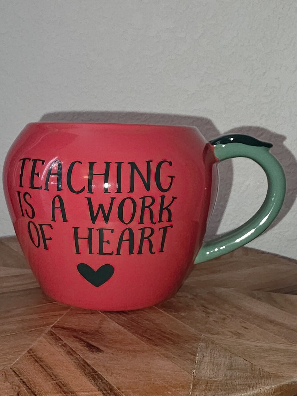 Teaching Is A Work Of Heart Red Ceramic Mug with Green Handle